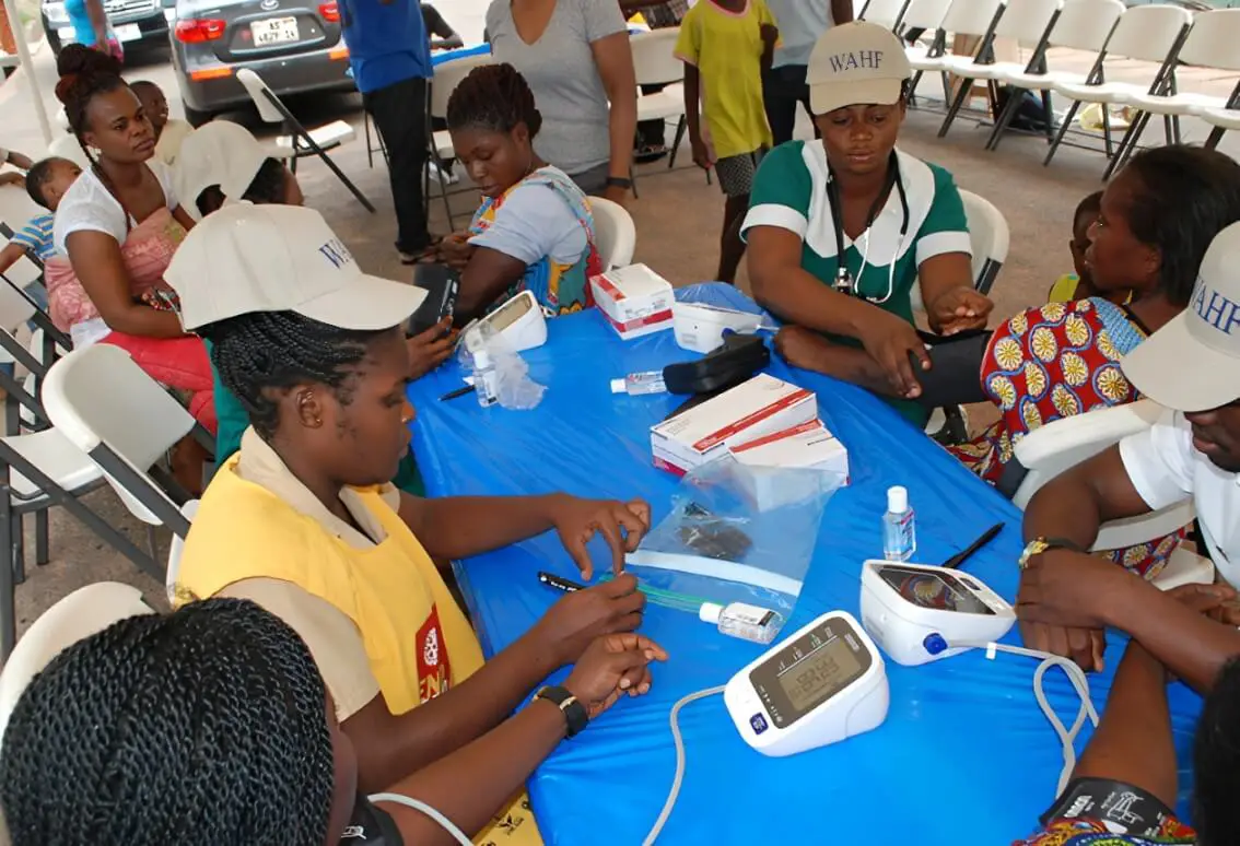 Volunteers organizing medical supplies on a mission